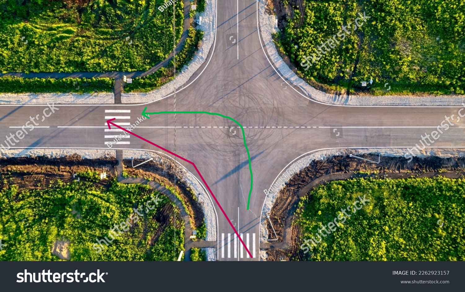 stock-photo--aerial-shot-of-a-flat-automobile-intersection-a-flat-road-with-markings-view-from-the-height-of-2262923157.jpg